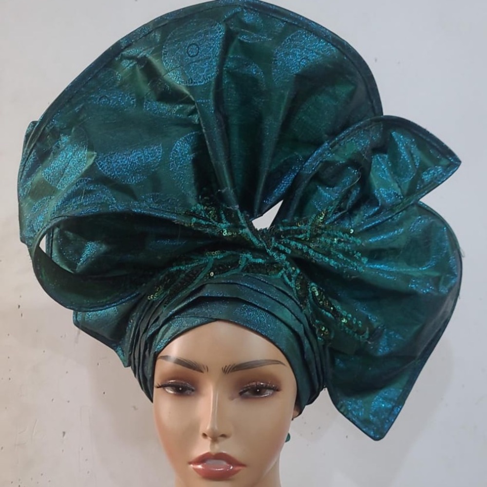 Royal 👸🏽  One Of  A Kind Designer Auto Gele Hat For All  Occasions

GEL2 0326